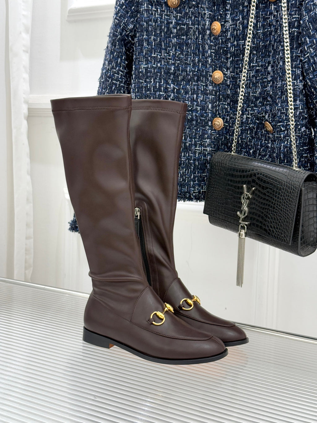 Gucci ladies knee-high leather boots in dark brown with gold hardware detail