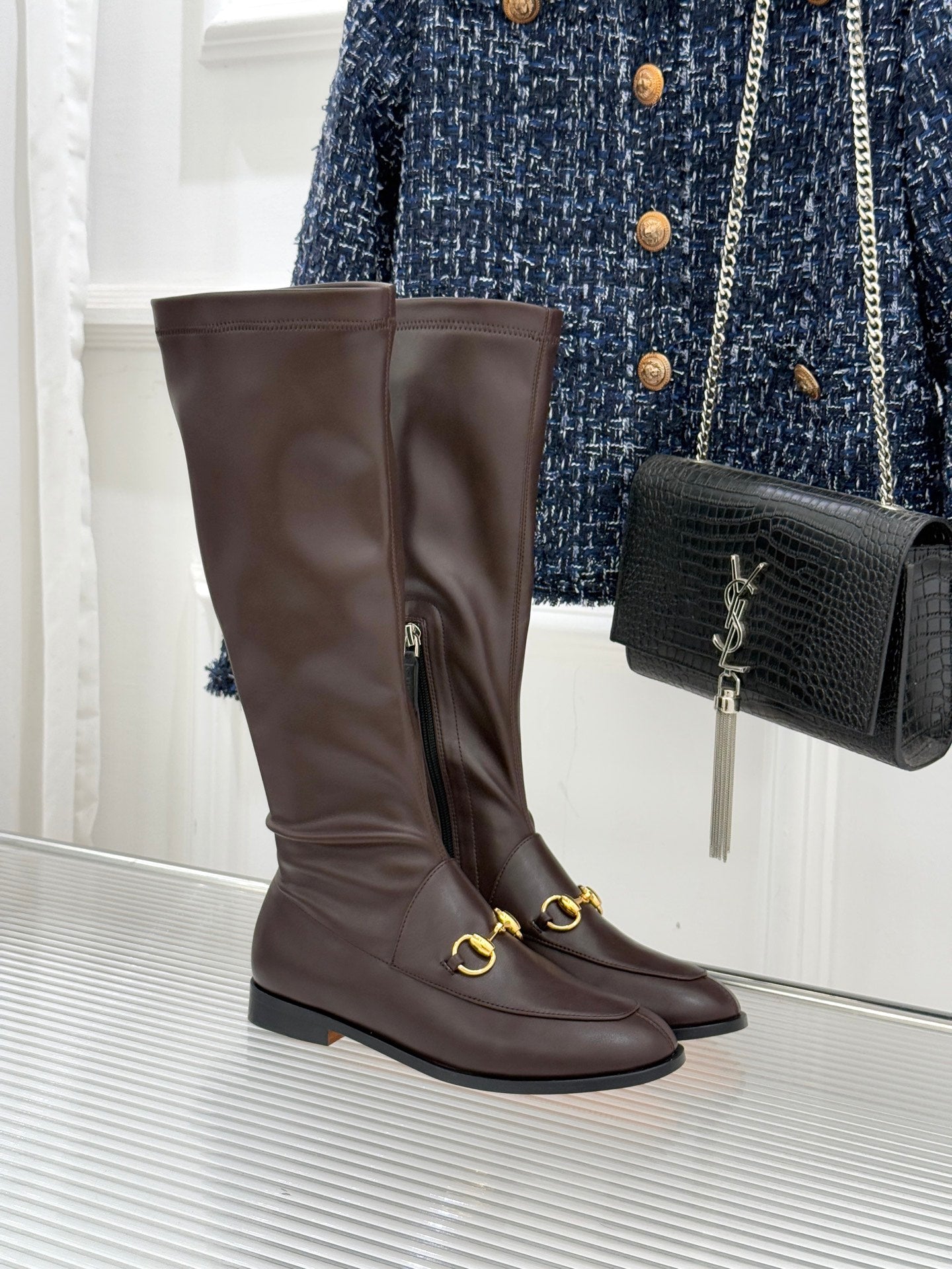 Gucci ladies knee-high leather boots in dark brown with gold hardware detail
