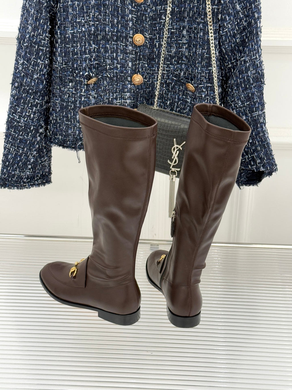 Gucci ladies knee-high leather boots, dark brown, back view with gold trim hardware