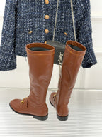 Gucci ladies knee-high leather boots, tan/brown, showing side profile and gold-tone hardware