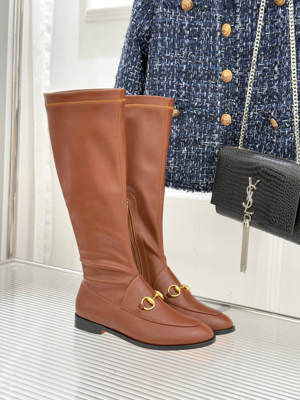 Gucci ladies knee-high leather boots, tan/brown, gold-tone hardware detail, flat sole