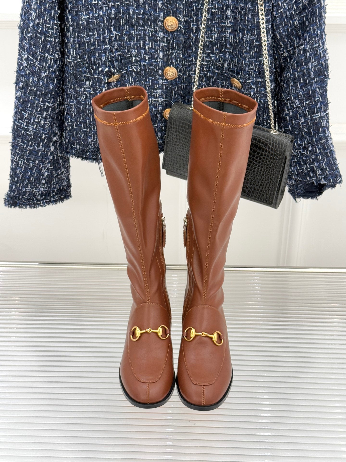 Gucci ladies pair of knee-high leather boots in tan/brown with gold-tone horsebit accents