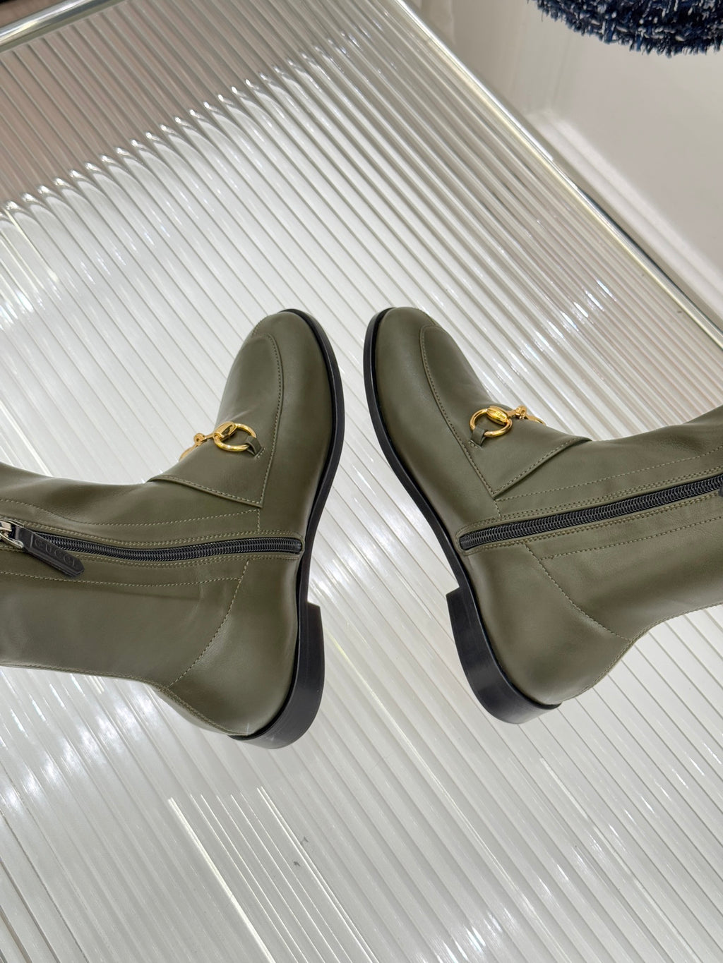 Gucci ladies olive leather ankle boots with gold horsebit detail and side zip