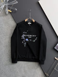 Black crewneck sweatshirt with blue floral wreath graphic and white chest text