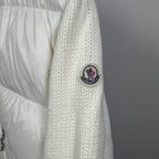 Long puffer jacket sleeve with off-white knit cuff and MONCLER crest patch
