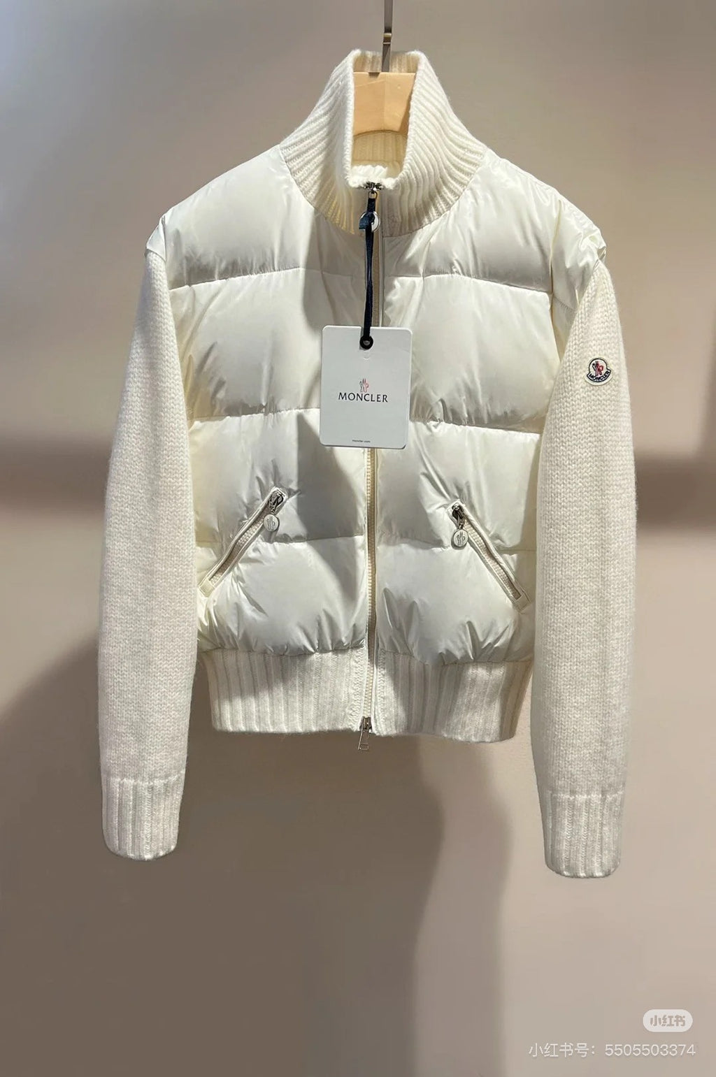 Moncler padded jacket with front zip, quilted chest panels, ribbed cuffs, white