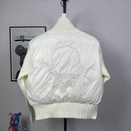 Long puffer jacket, back view, off-white with large MONCLER-style embossed logo