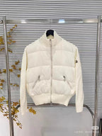 Moncler padded jacket with quilted panels, front zipper, and ribbed turtleneck, white