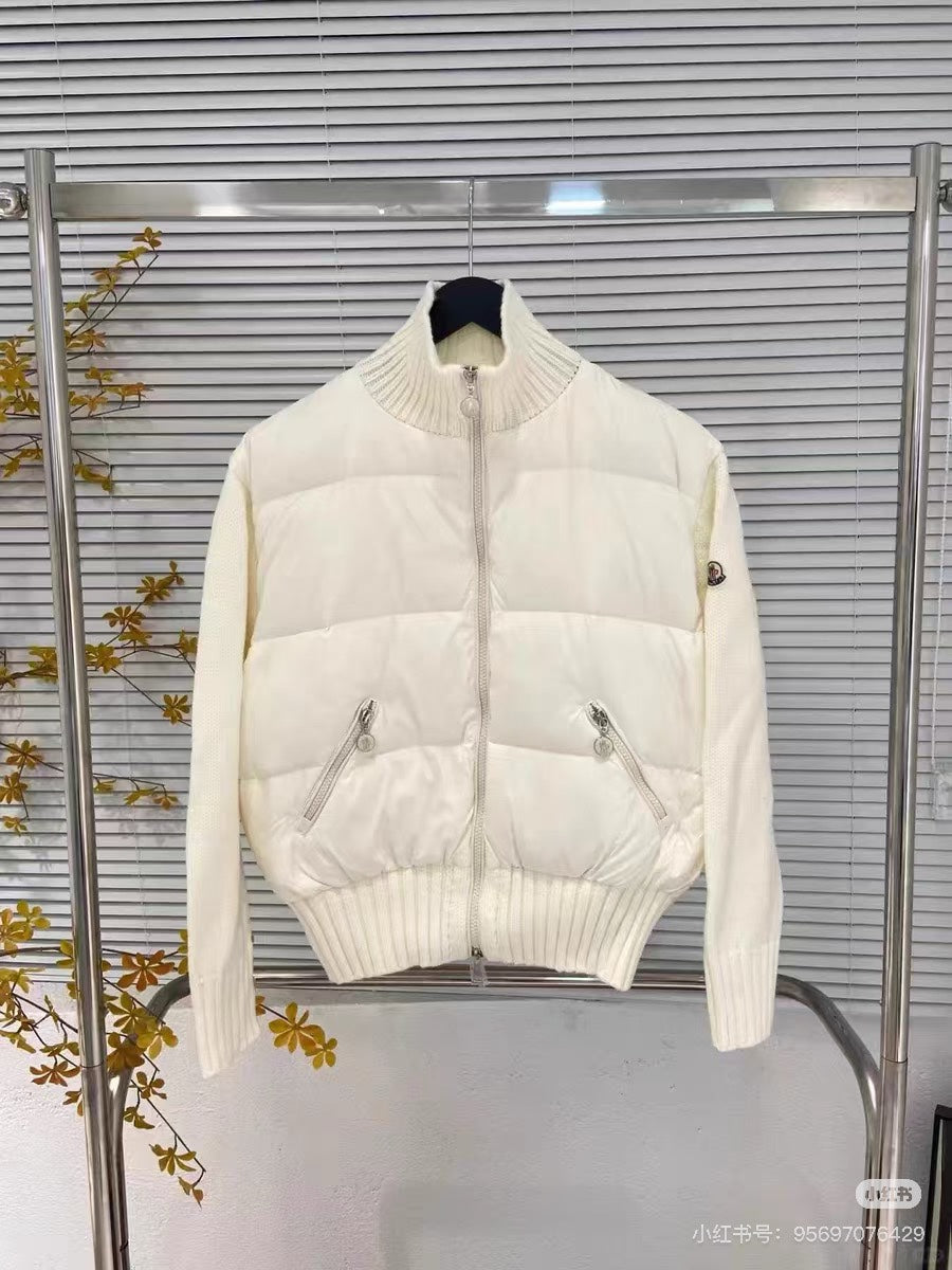 Moncler padded jacket with quilted panels, front zipper, and ribbed turtleneck, white