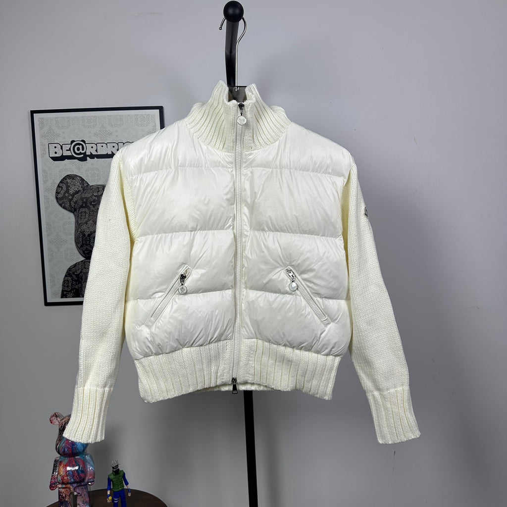 Moncler long puffer jacket in off-white with front zipper and knit ribbed cuffs