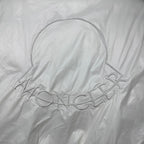 Long puffer jacket back with off-white embossed MONCLER lettering