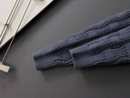 Dark blue ribbed knit sleeve cuff and hem