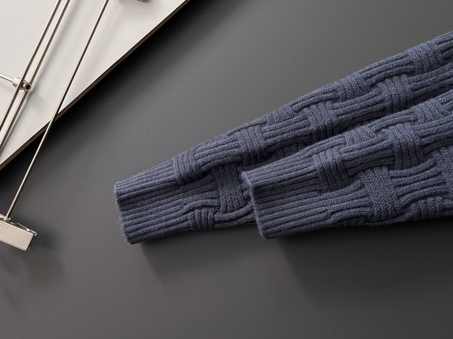 Dark blue ribbed knit sleeve cuff and hem