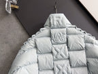 Moncler light puffer jacket hood with embossed monogram details on back
