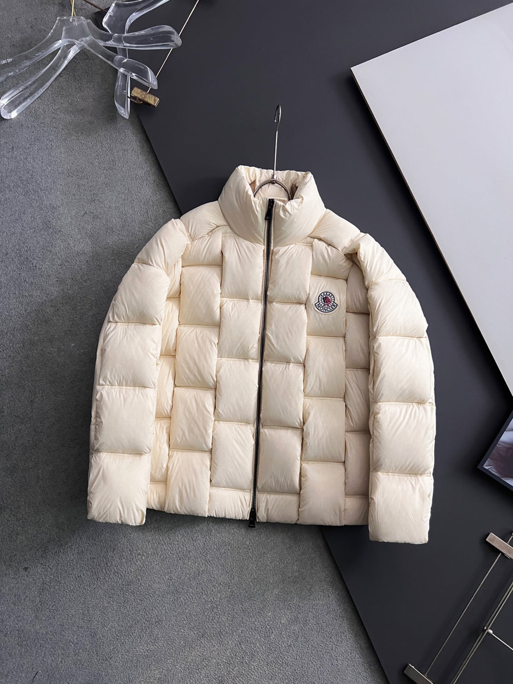 Moncler long puffer jacket, cream, full-zip front with circular chest patch