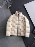 Moncler long puffer jacket, cream, full-zip front with circular chest patch