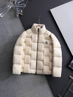 Moncler long puffer jacket, cream, full-zip front with circular chest patch