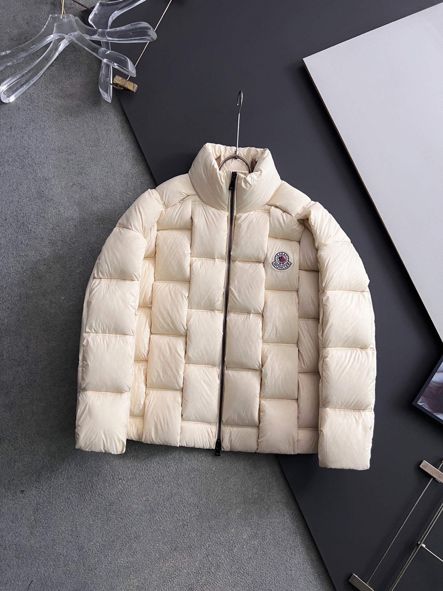 Moncler long puffer jacket, cream, full-zip front with circular chest patch