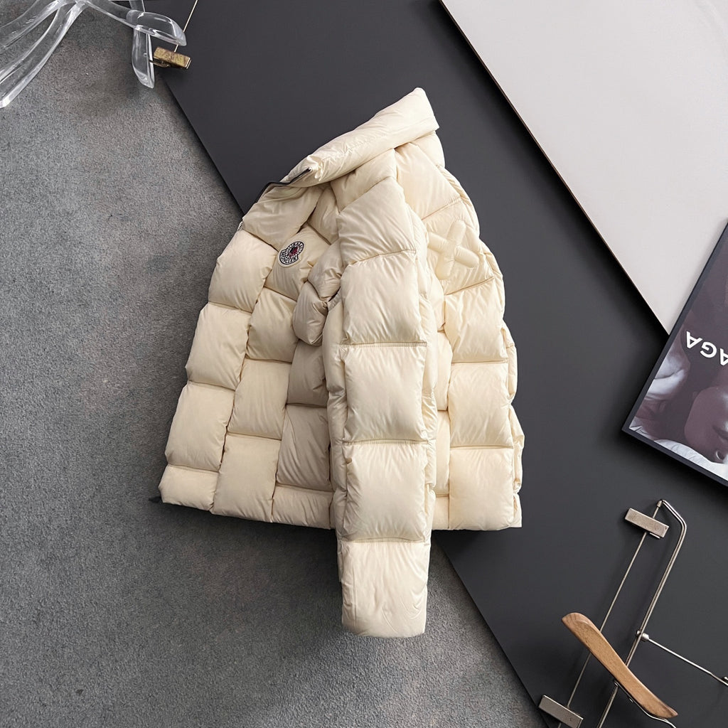 Moncler long puffer jacket, cream, side view with chest logo patch