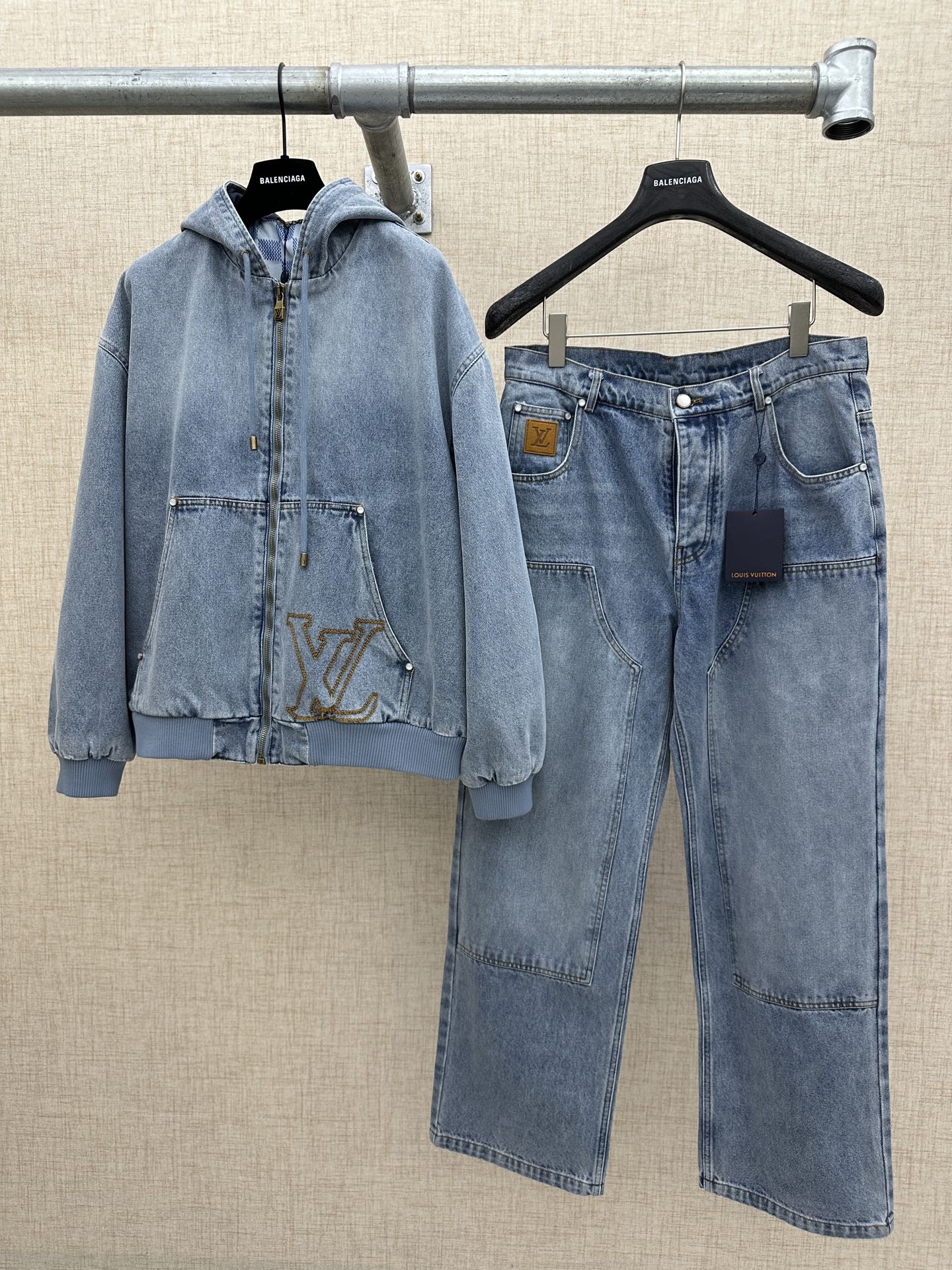 Light blue denim jacket with hood and denim pants, shown side by side
