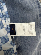 Denim jacket care label tag on inner collar