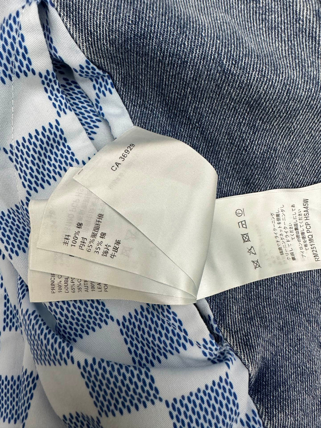 Care and size tags on blue-and-white check long garment