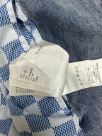Care and size tags on blue-and-white check long garment
