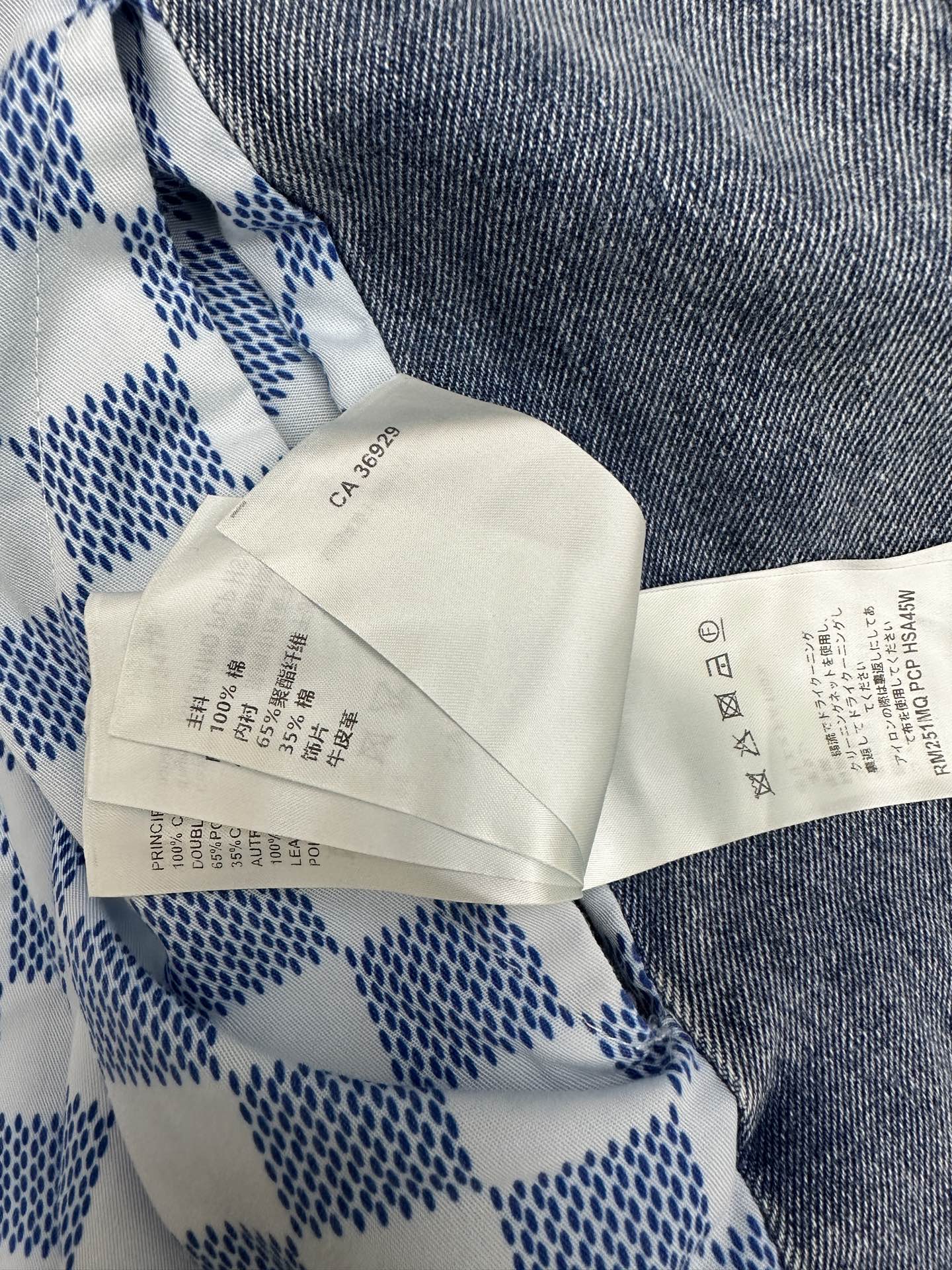 Care and size tags on blue-and-white check long garment