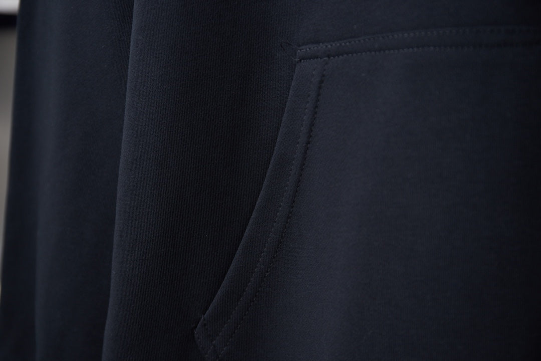 Burberry navy hoodie fabric and stitched kangaroo pocket seam detail