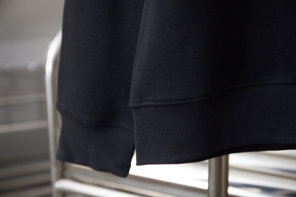 Black sweatshirt sleeve cuff and ribbed hem