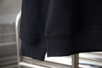 Black sweatshirt sleeve cuff and ribbed hem