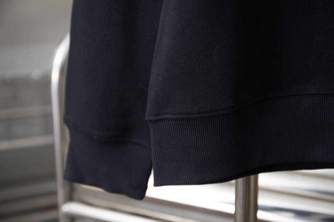 Black sweatshirt sleeve cuff and ribbed hem