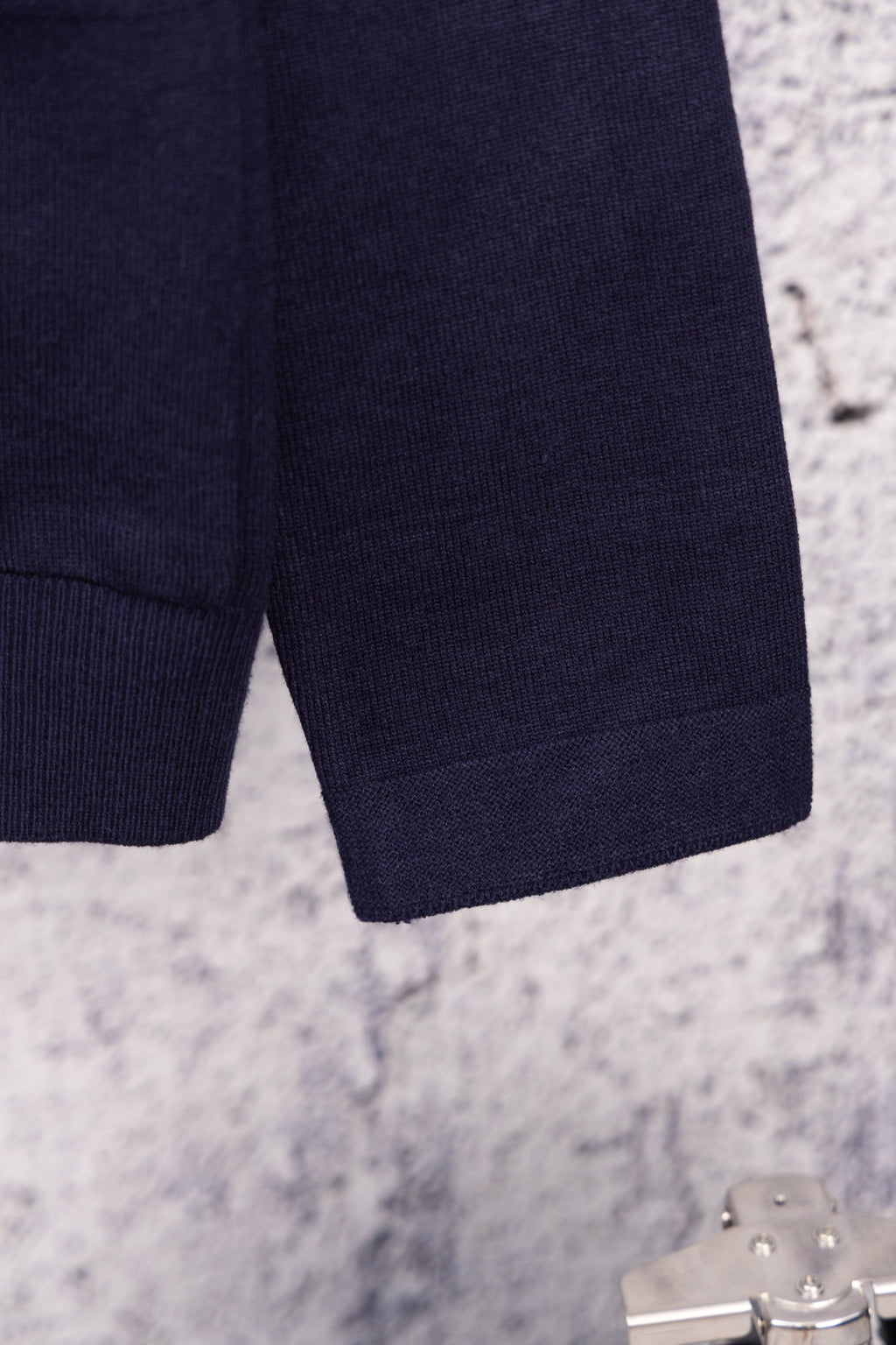 Navy knit cardigan hem and cuff