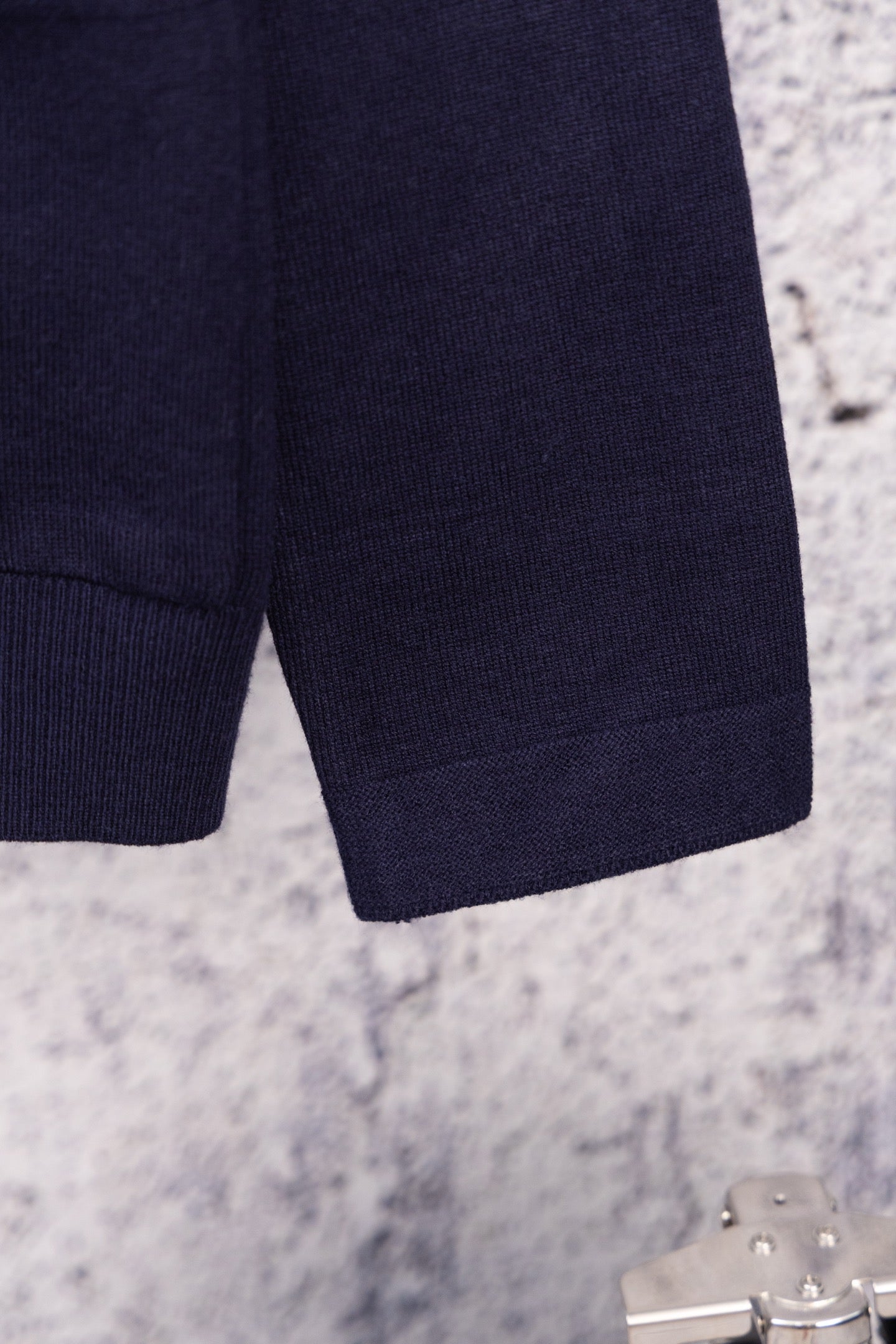 Navy knit cardigan hem and cuff