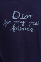 Navy crewneck top close-up with Dior 'for my real friends' print