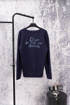 Navy long-sleeve cardigan with back text graphic and blue logo stitching