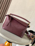 Loewe burgundy leather small shoulder bag with top handle, gold hardware, front flap