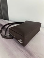 Fendi shoulder bag in dark brown with front logo clasp and adjustable strap