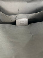 Fendi bag interior care label on light lining near small logo patch