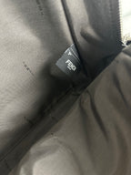 Fendi bag interior lining with Fendi label and zipper seam close-up