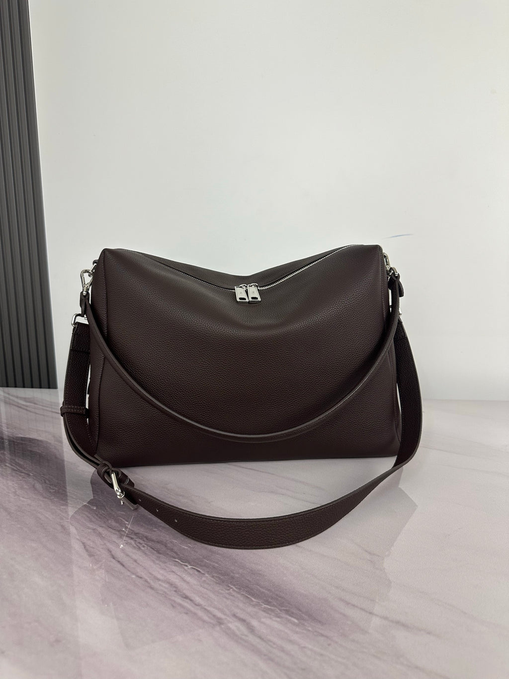 Fendi hobo shoulder bag in dark brown with top handle and front strap loops