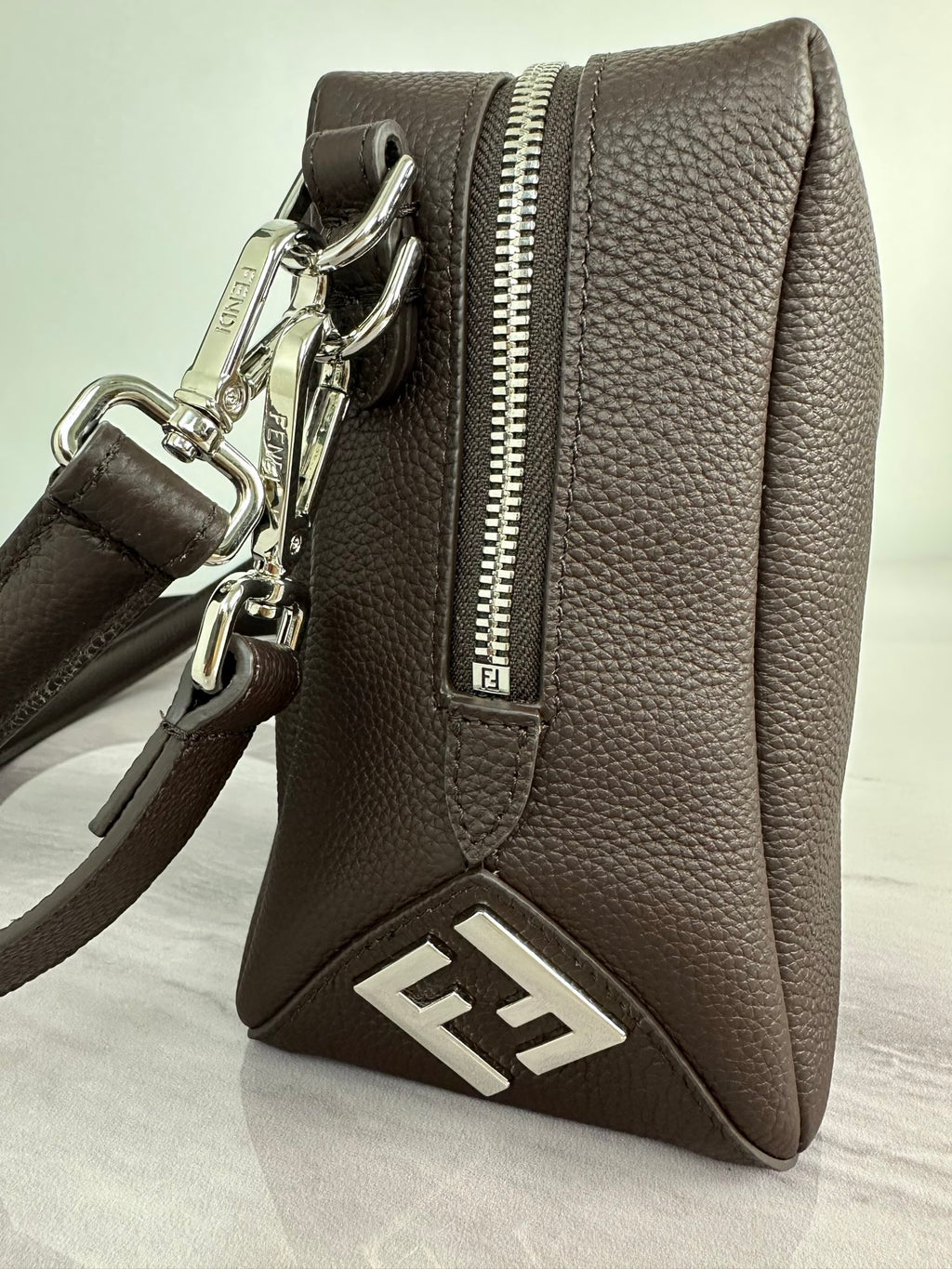 Fendi crossbody bag in dark brown with silver zipper and FF front emblem