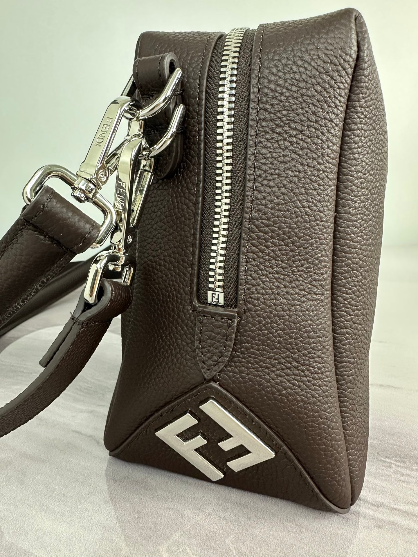 Fendi crossbody bag in dark brown with silver zipper and FF front emblem