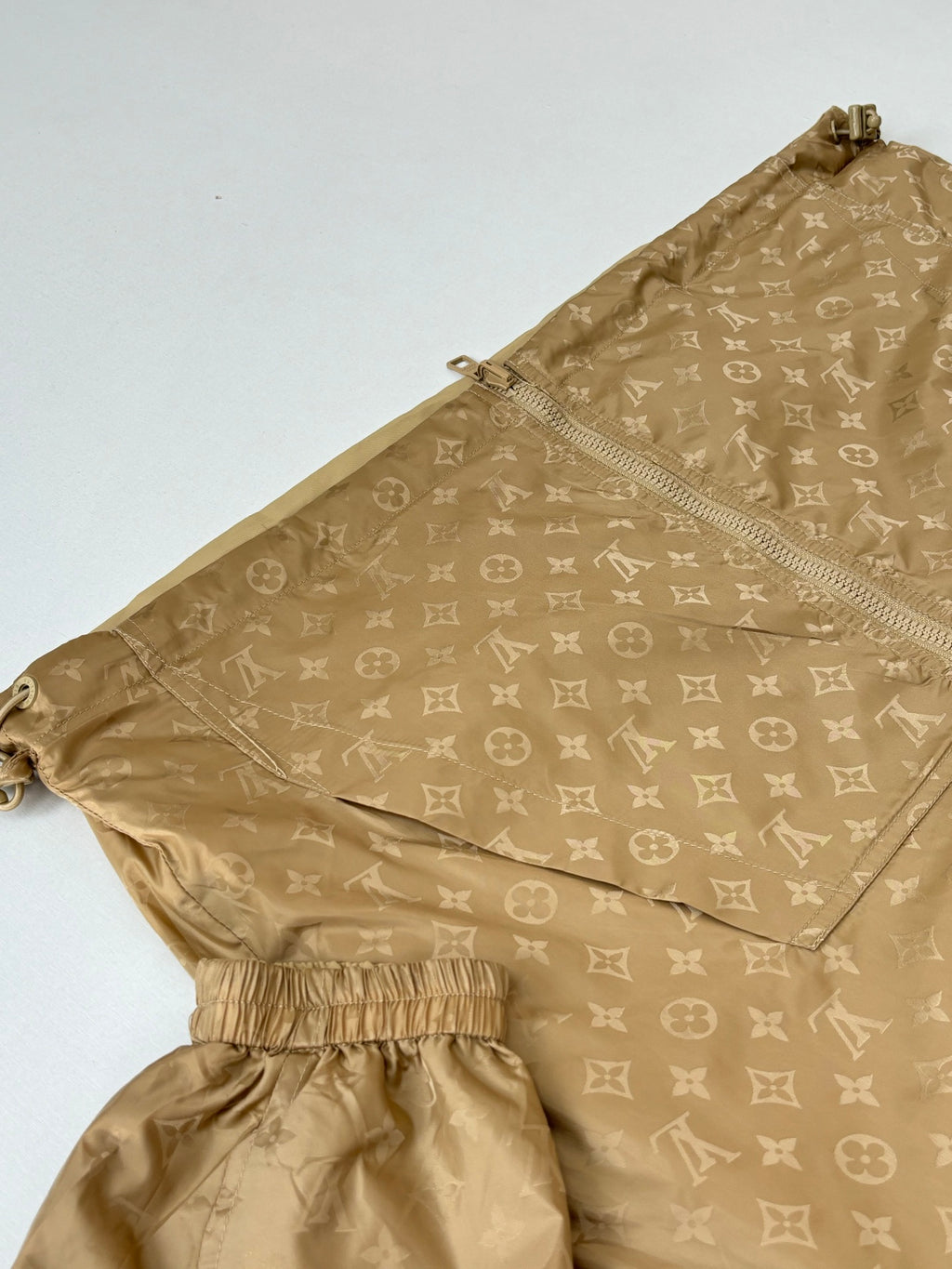 Louis Vuitton monogram hooded jacket, tan with elastic cuffs and hem