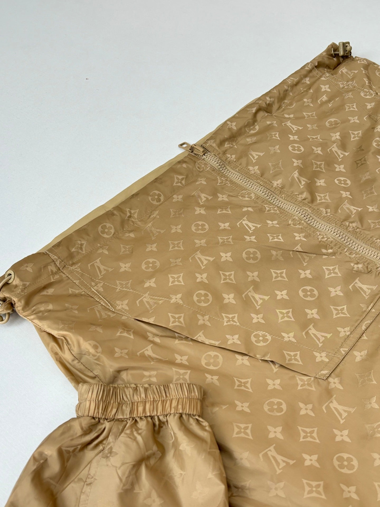 Louis Vuitton monogram hooded jacket, tan with elastic cuffs and hem