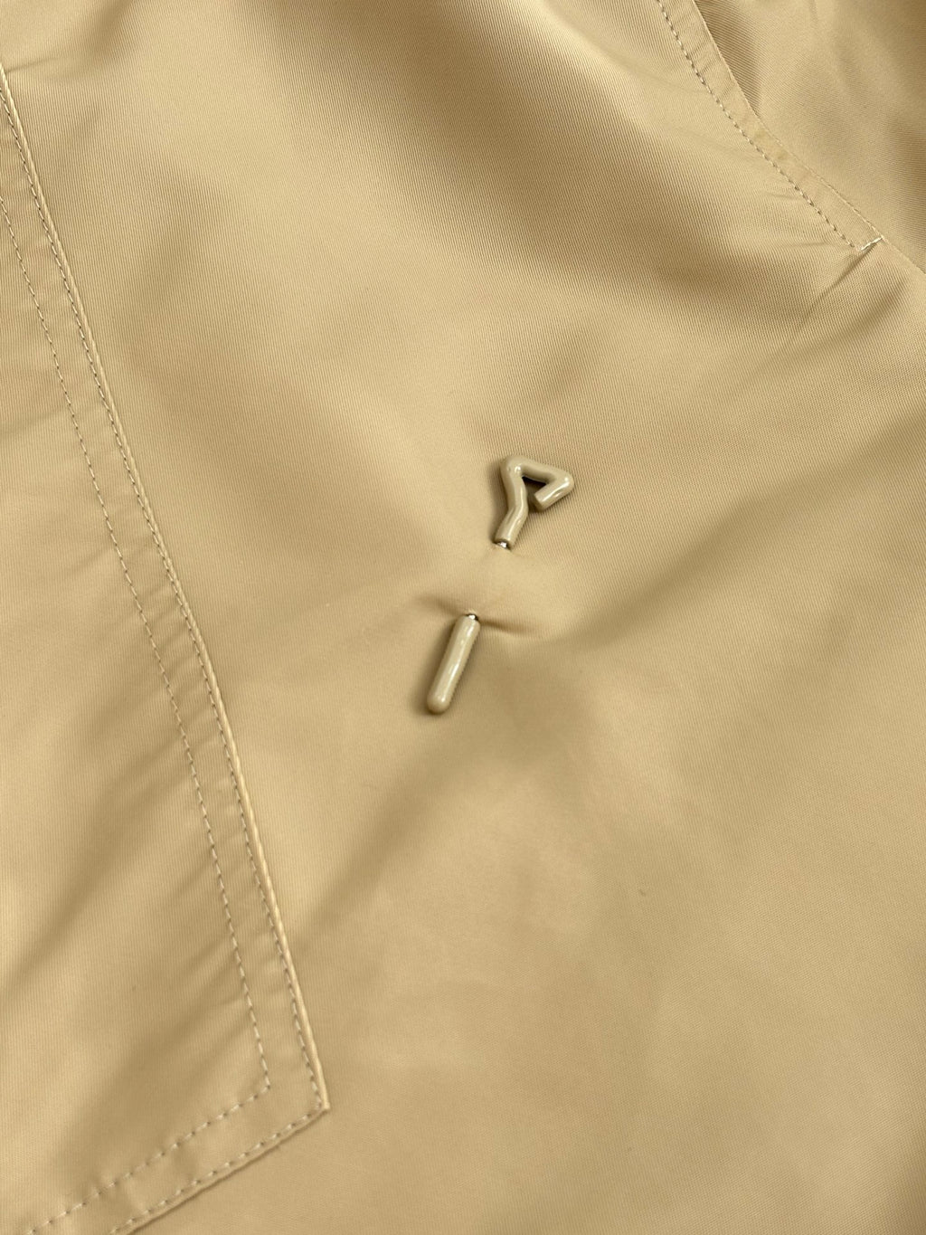 Long pants with metal button and front zipper, beige