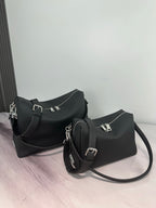 Two Fendi dark leather bags with straps, including a hobo style and mini crossbody