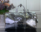 Louis Vuitton metallic silver monogram duffel bag with top handles and shoulder strap