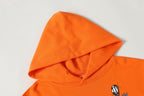 Orange hoodie hood with inner seam detail