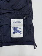 Burberry navy puffer jacket interior pocket lining with brand label and zipper